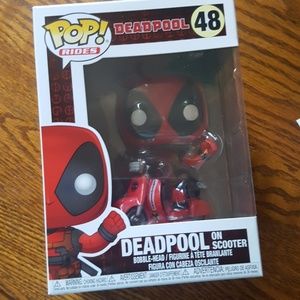 Deadpool on scooter